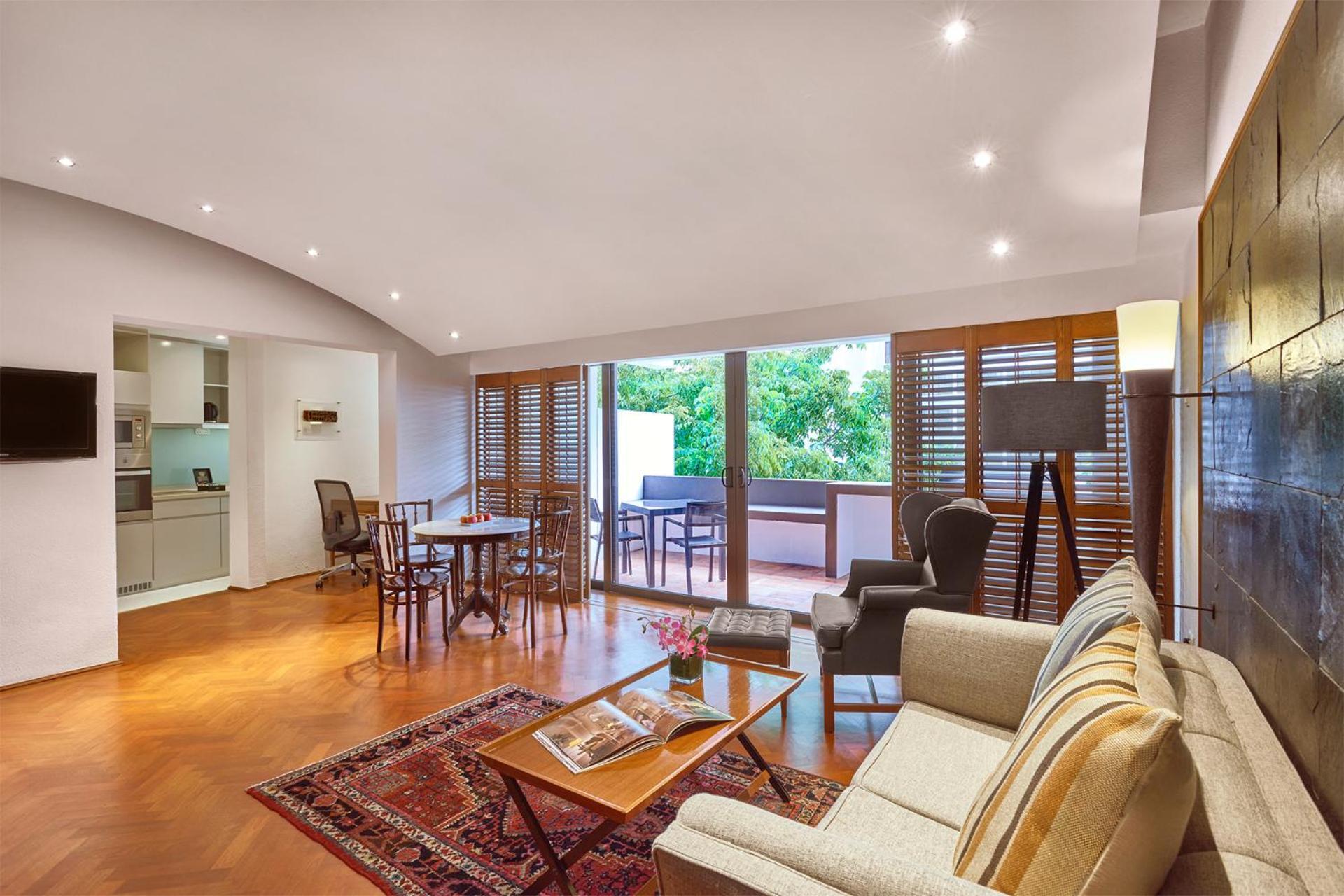 กู๊ดวู้ด พาร์ค โฮเทล Hotel สิงคโปร์ ห้อง รูปภาพ A typical apartment interior